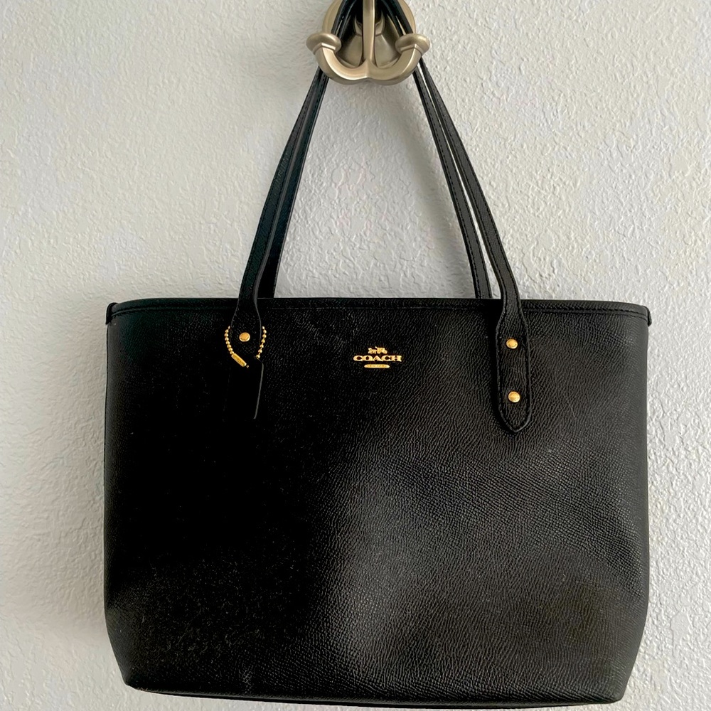 Mini black leather tote from Coach with gold hardware